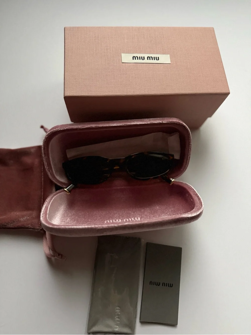 Miu Miu Regard Tortoiseshell Women’s Sunglasses
